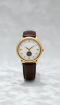 Nordwell Reserve Gold Automatic Watch, front view on neutral background